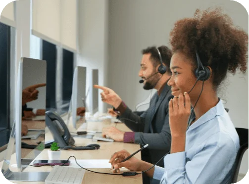 Friendly bilingual Answering365 operators handling calls on headsets